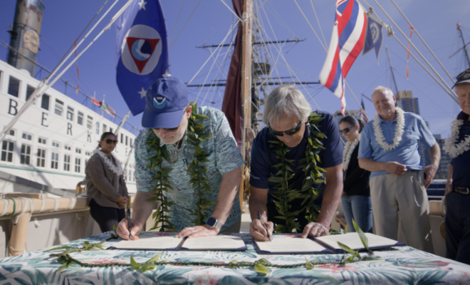NOAA Administrator Rick Spinrad, Ph.D., and Polynesian Voyaging Society CEO Nainoa Thompson signed the MOU in San Diego, California, aboard Hōkūle‘a. (Image credit: Ryan Miyamoto)